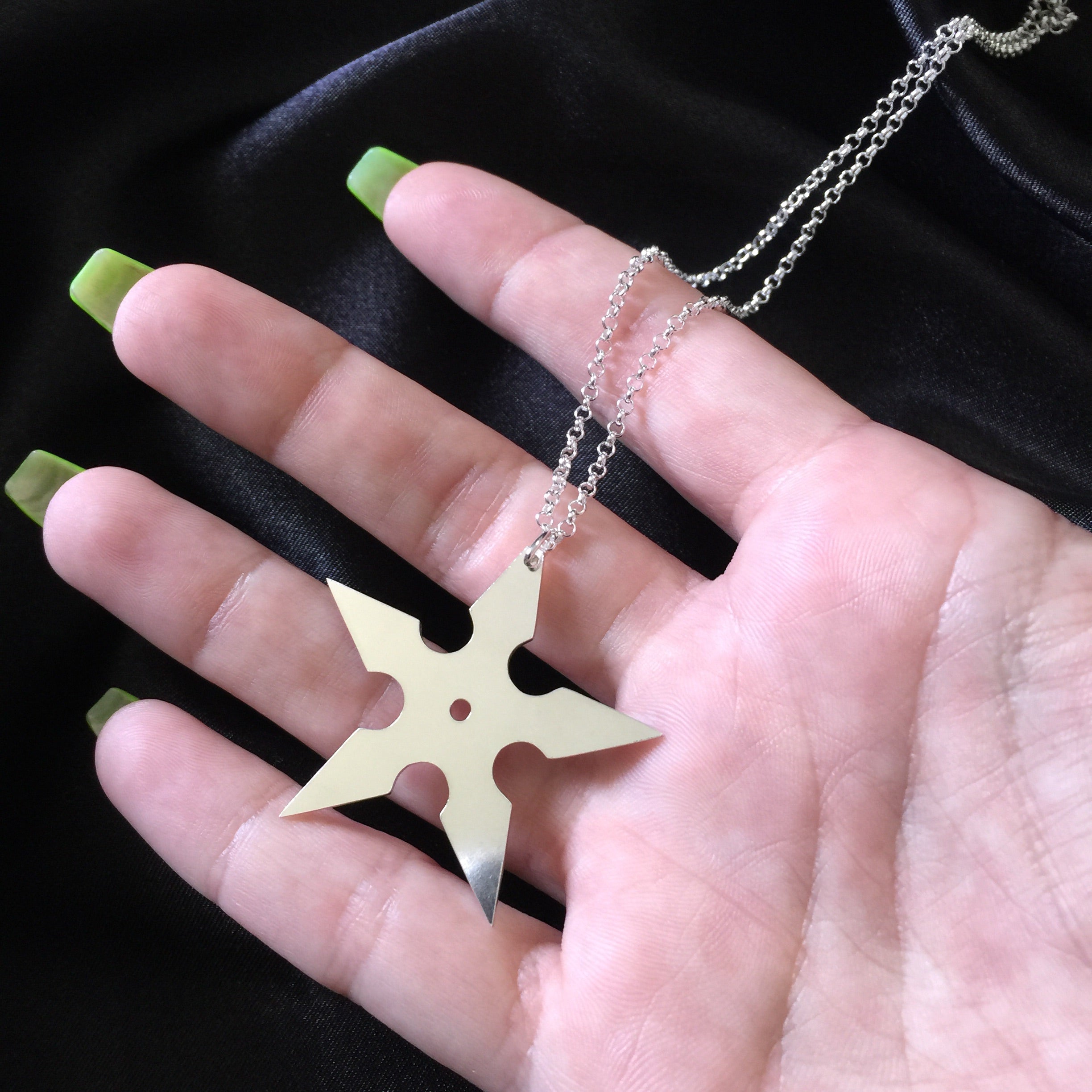 Throwing Star Necklace.